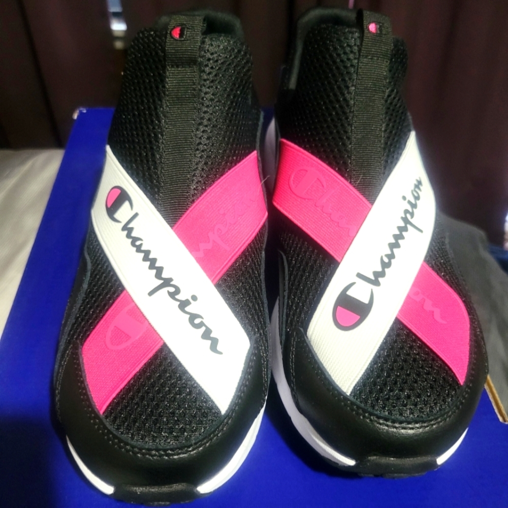 Never worn Champion slip on sneakers